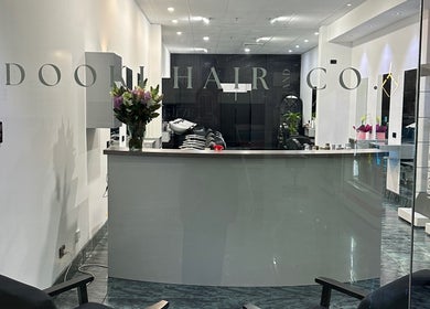 Elegant entrance of Dooki Hair & Co. in Melbourne, Victoria, AU with sleek design and modern decor.