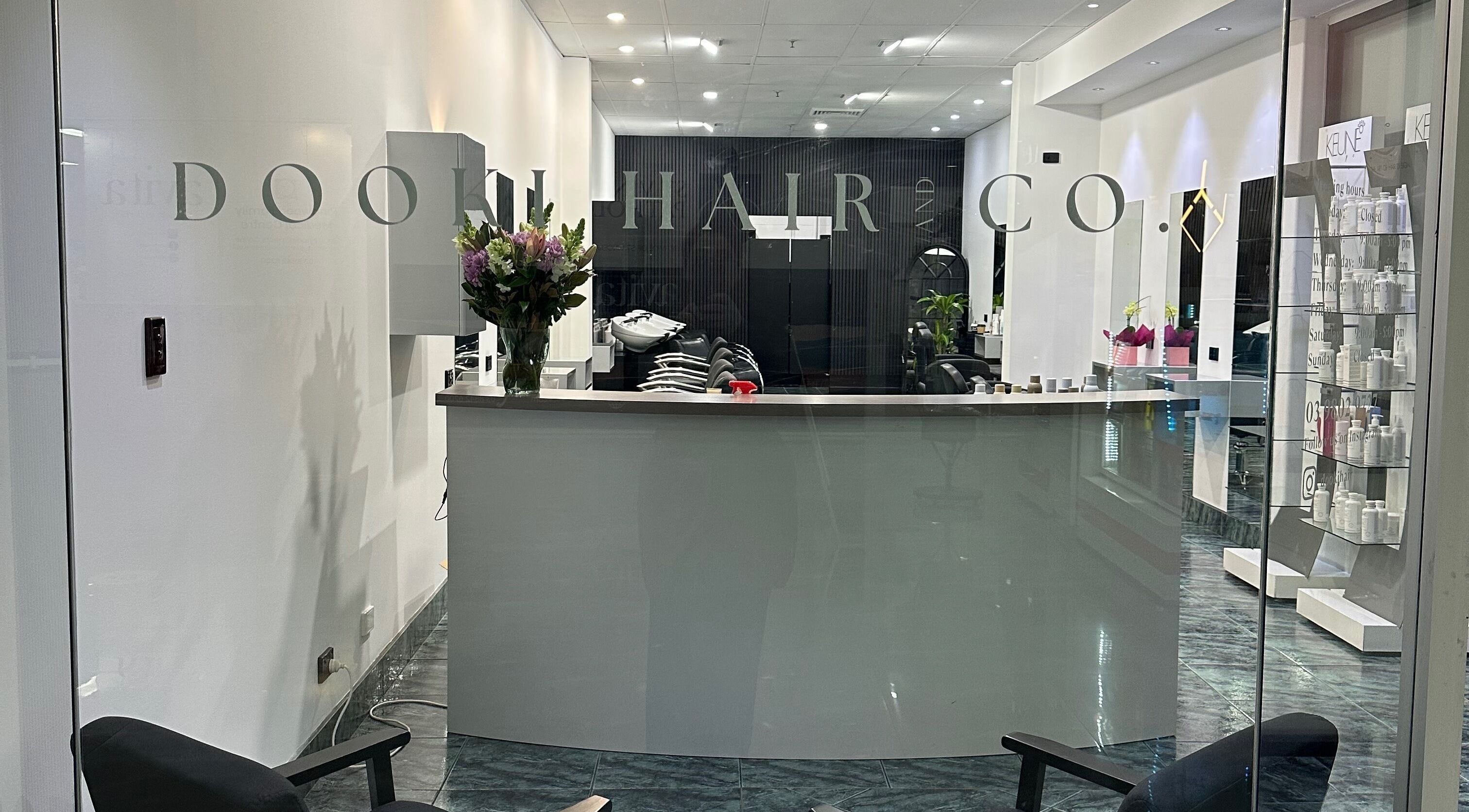 Elegant entrance of Dooki Hair & Co. in Melbourne, Victoria, AU with sleek design and modern decor.