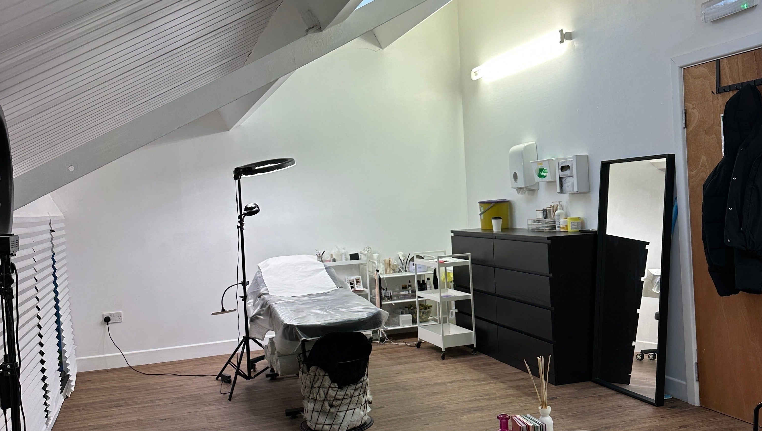 Elegant treatment room at Linglash & Aesthetics, London, England, GB offers a serene beauty experience.