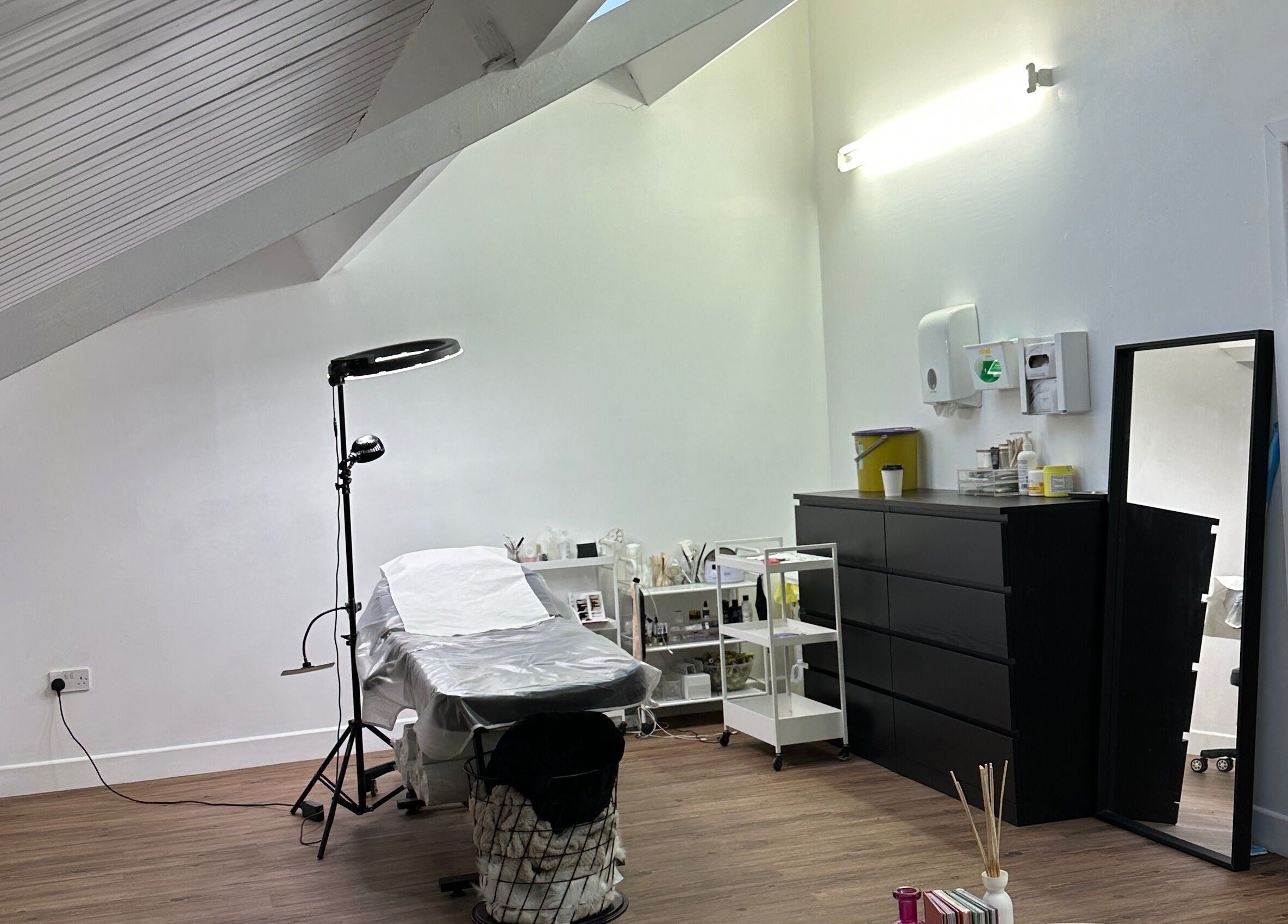 Elegant treatment room at Linglash & Aesthetics, London, England, GB offers a serene beauty experience.