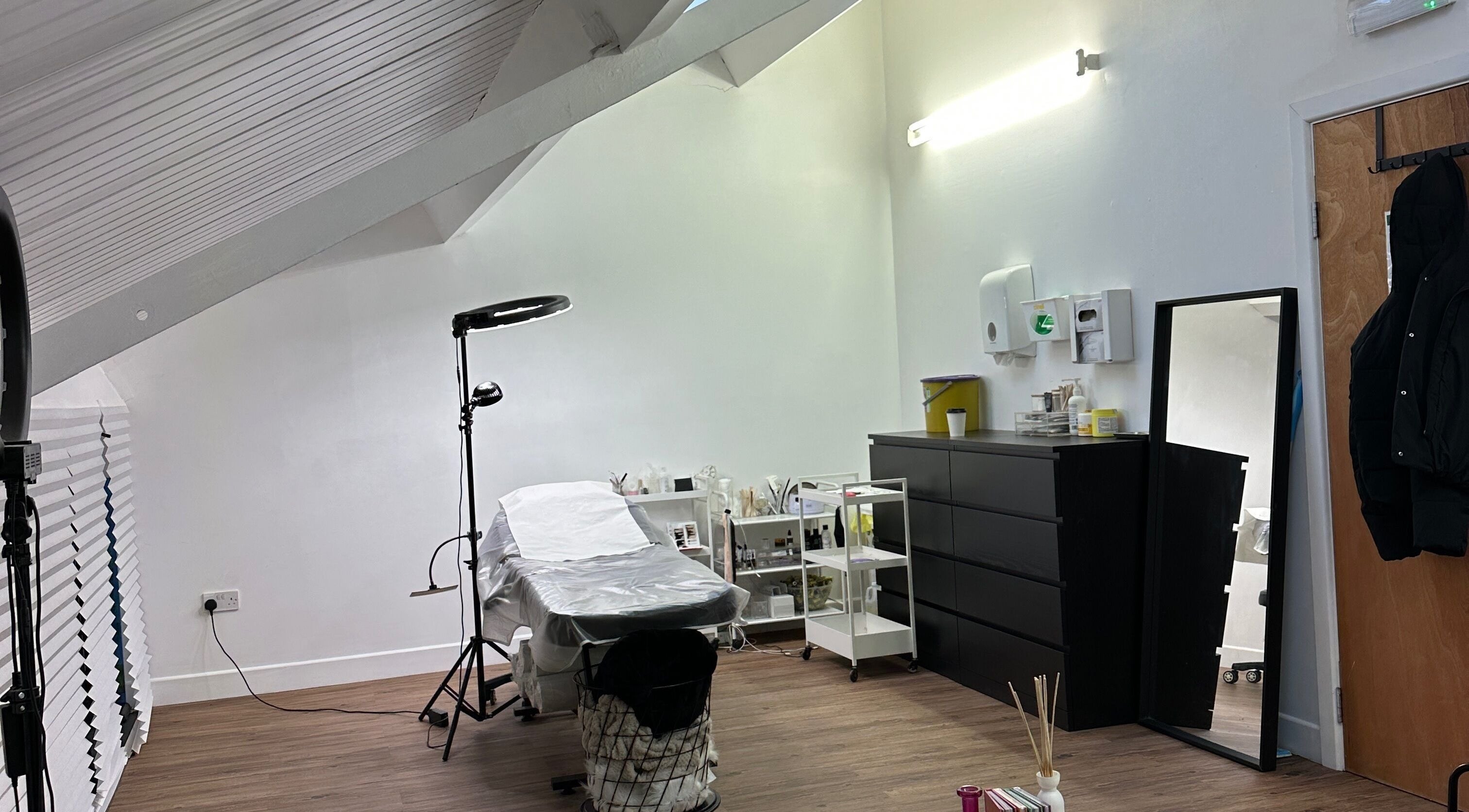 Elegant treatment room at Linglash & Aesthetics, London, England, GB offers a serene beauty experience.
