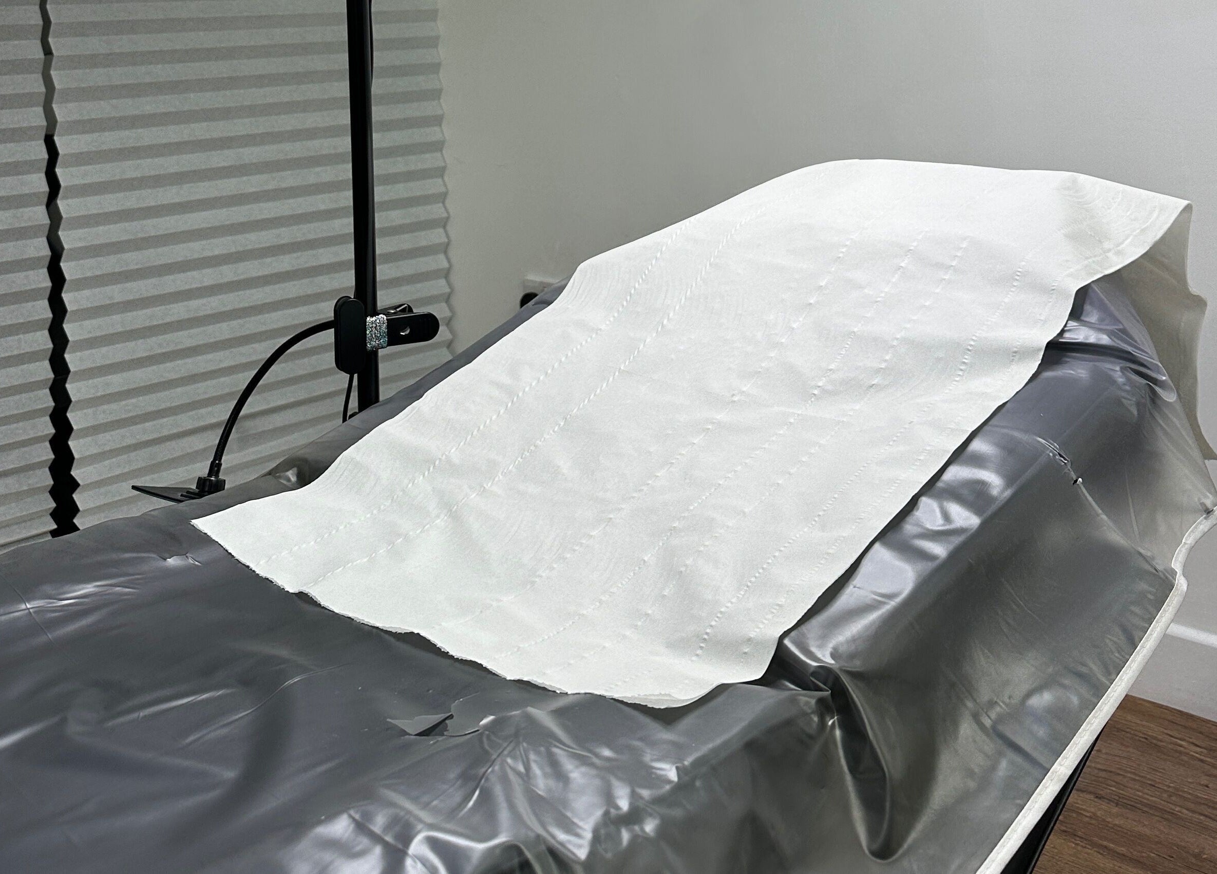Treatment bed at Linglash & Aesthetics, London, England, GB for comfort and relaxation during beauty services.