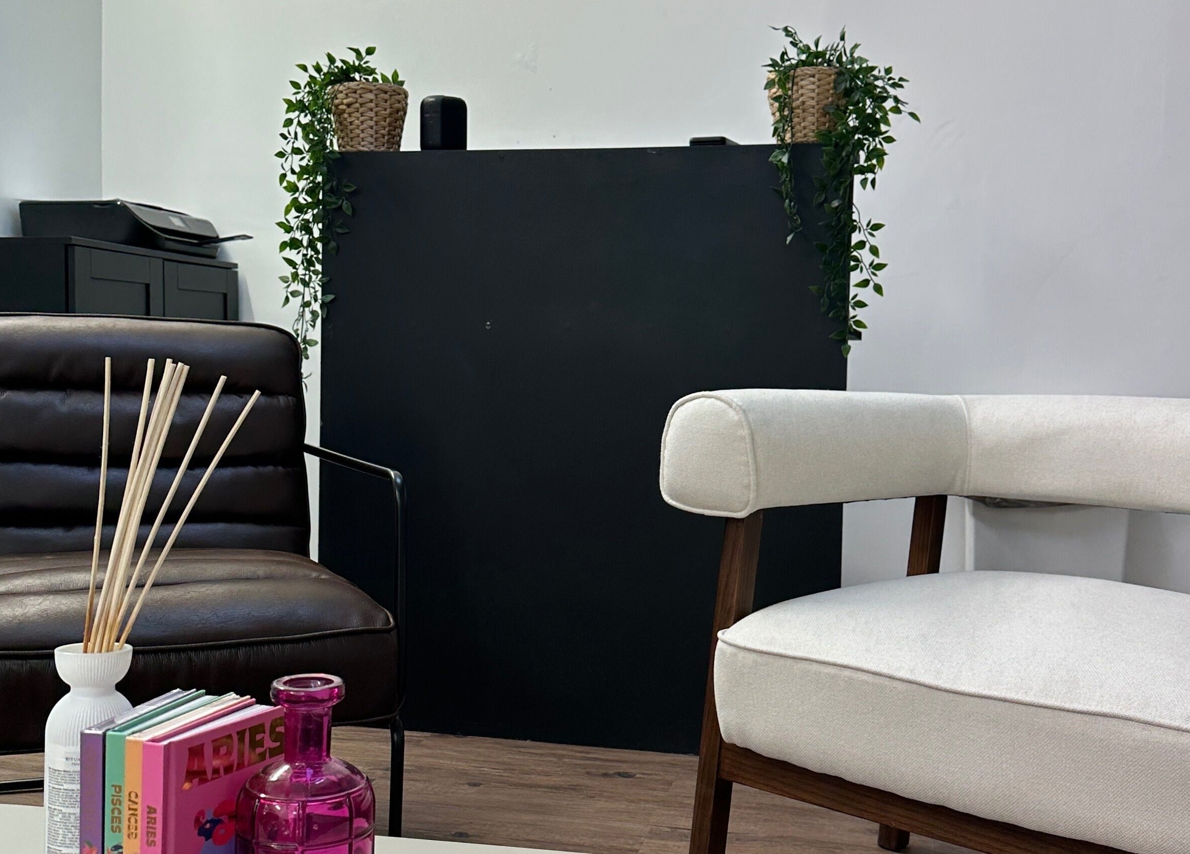 Elegant waiting area at Linglash & Aesthetics, London, England, GB with stylish chairs and decor.