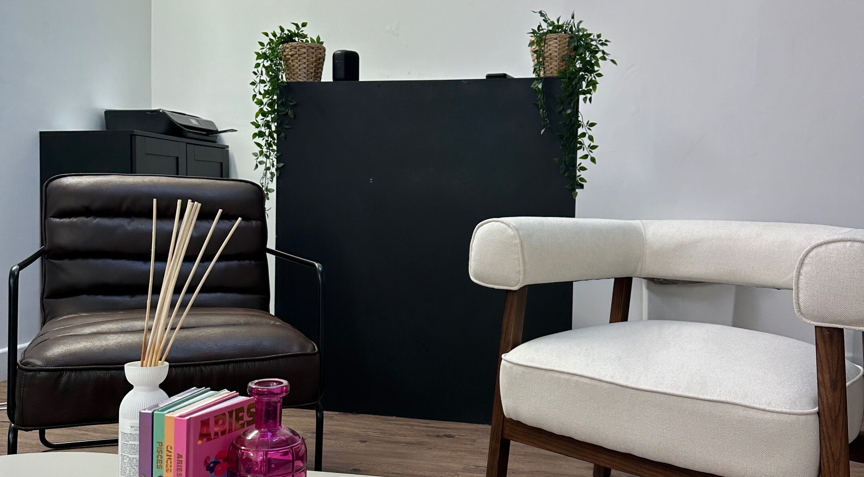 Elegant waiting area at Linglash & Aesthetics, London, England, GB with stylish chairs and decor.