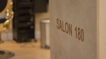 Stylish interior wall with Salon 180 sign at صالون ١٨٠ للحلاقة, Al Badi', Riyadh Province, SA.