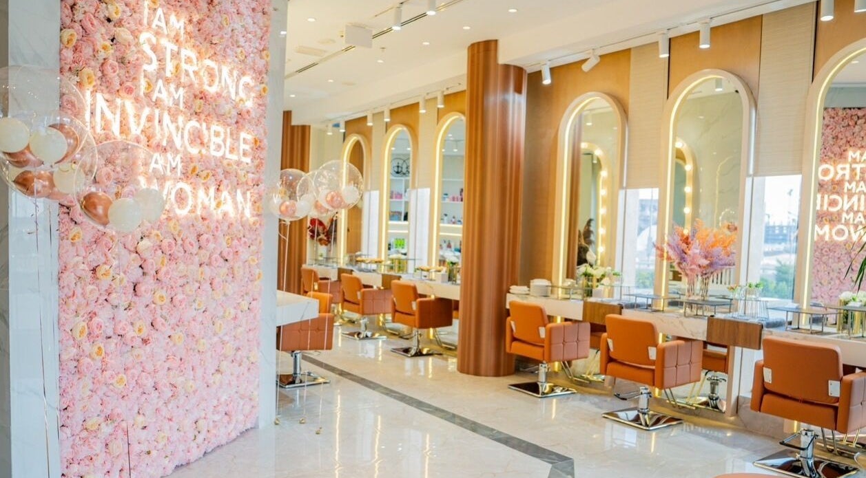 Corail Beauty Salon in Dubai, Dubai, AE featuring a floral wall and stylish salon interior.