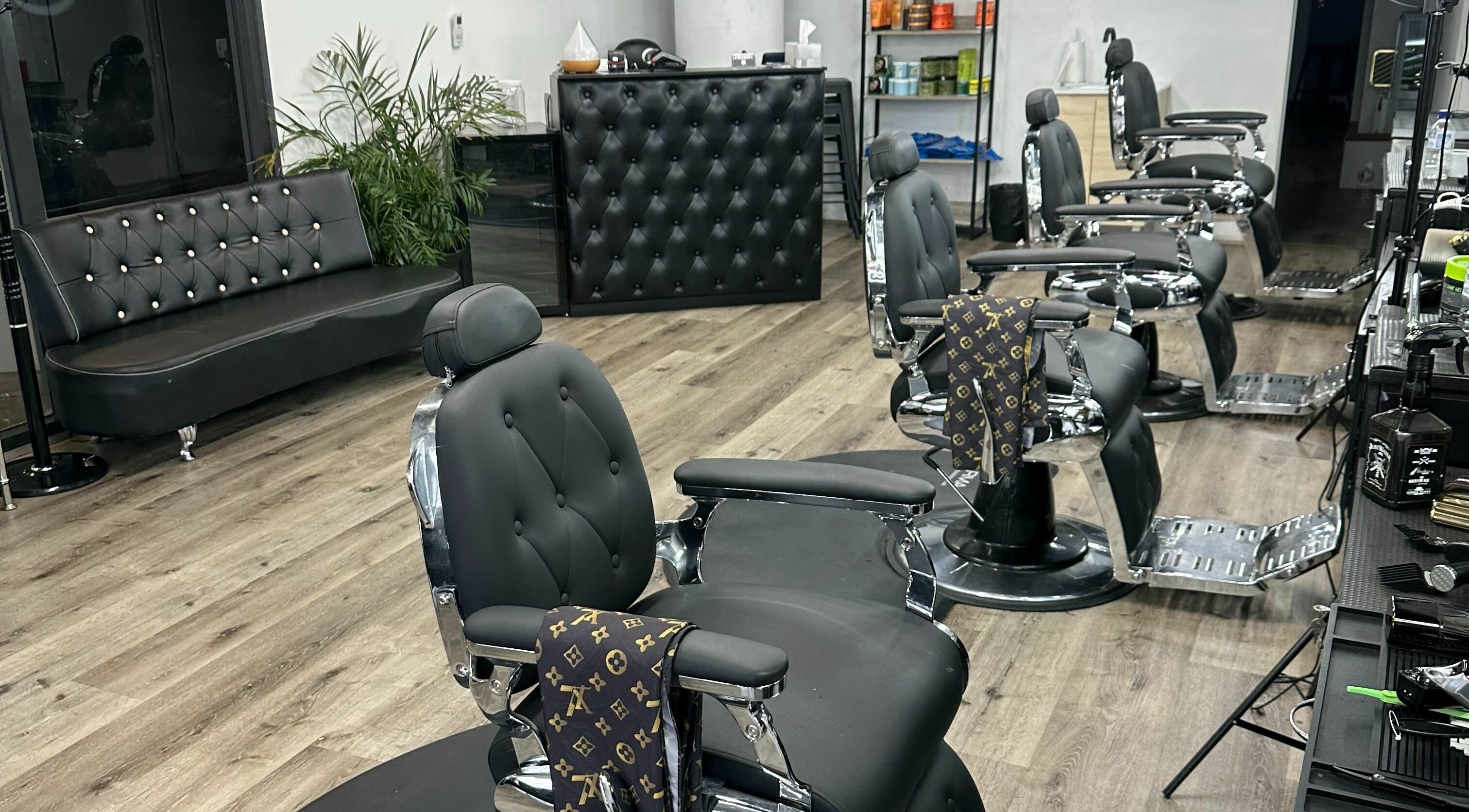 Sleek barber chairs and modern decor at Lucy Barber Shop, Melbourne, Victoria, AU, offer a stylish grooming experience.