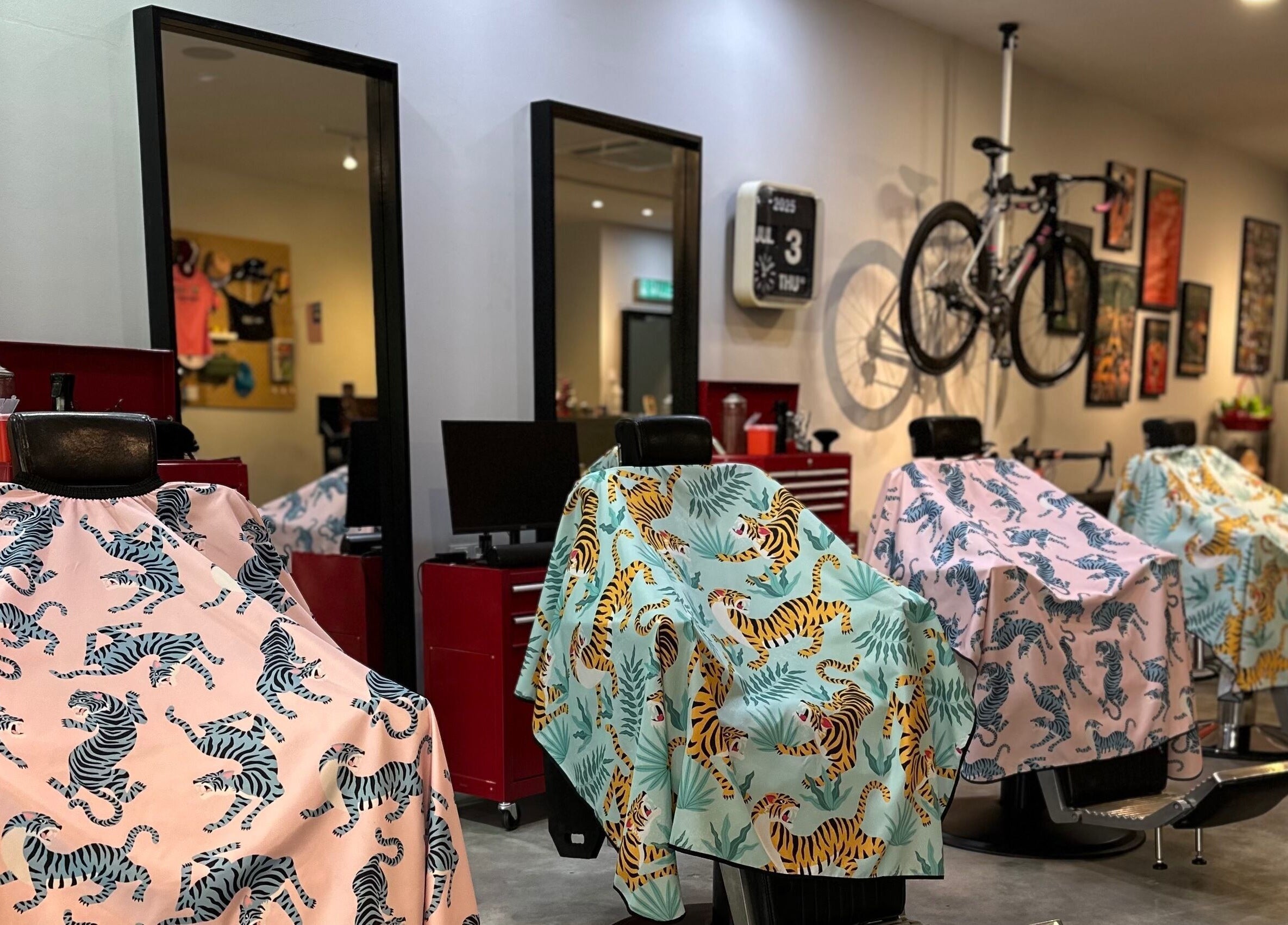 Vibrant barber chairs with animal-themed covers at Pedal Barbers, Shah Alam, Selangor, MY.