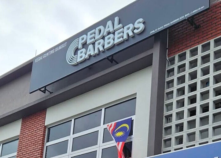 Front facade of Pedal Barbers in Shah Alam, Selangor, MY with a modern design and prominent signage.