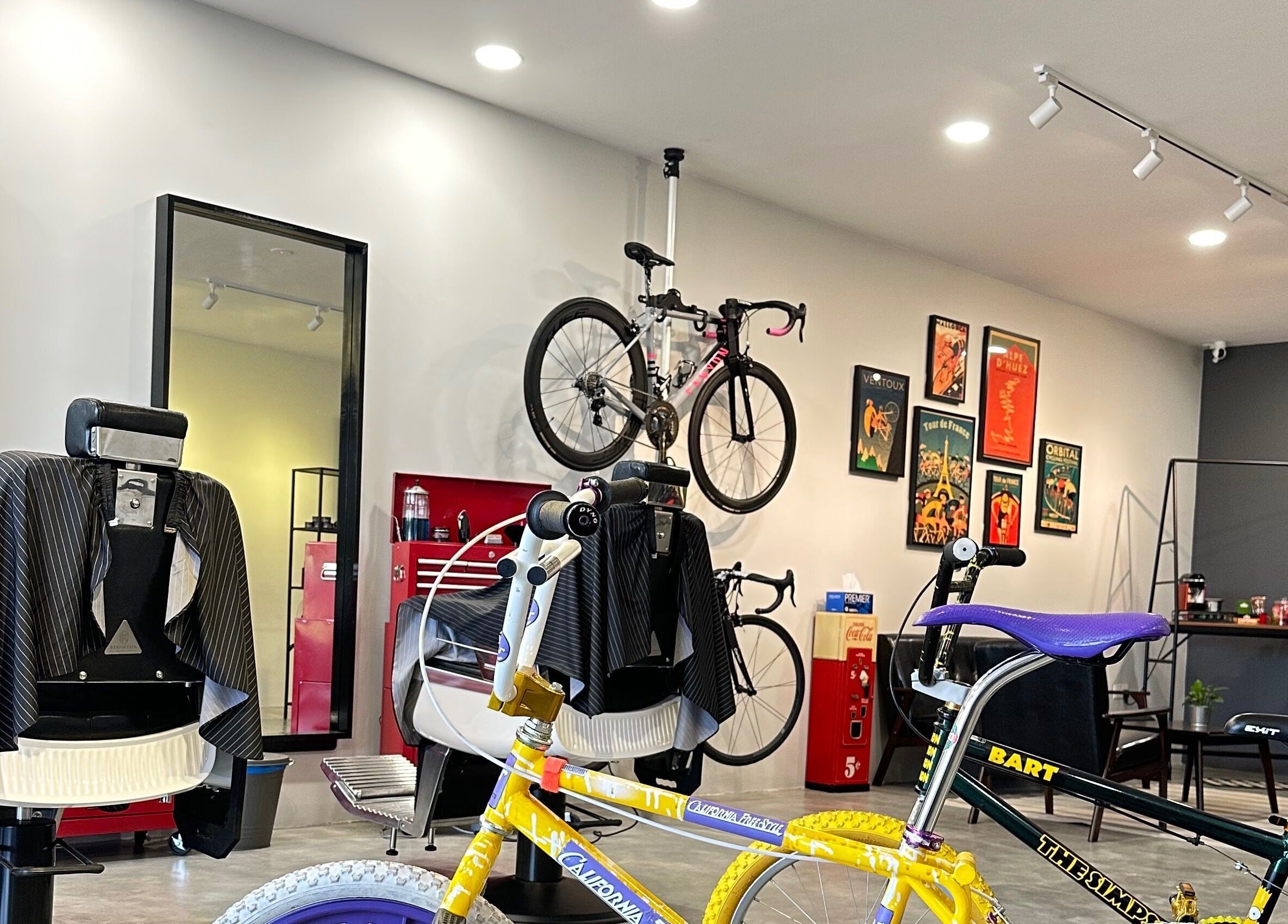 Interior of Pedal Barbers in Shah Alam, Selangor, MY with bicycles and barber chairs creating a unique atmosphere.