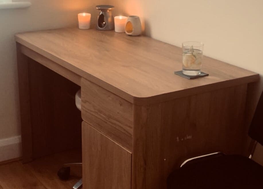 Cozy desk with candles at Kilkenny Acupuncture Clinic in Kilkenny, County Kilkenny, IE.