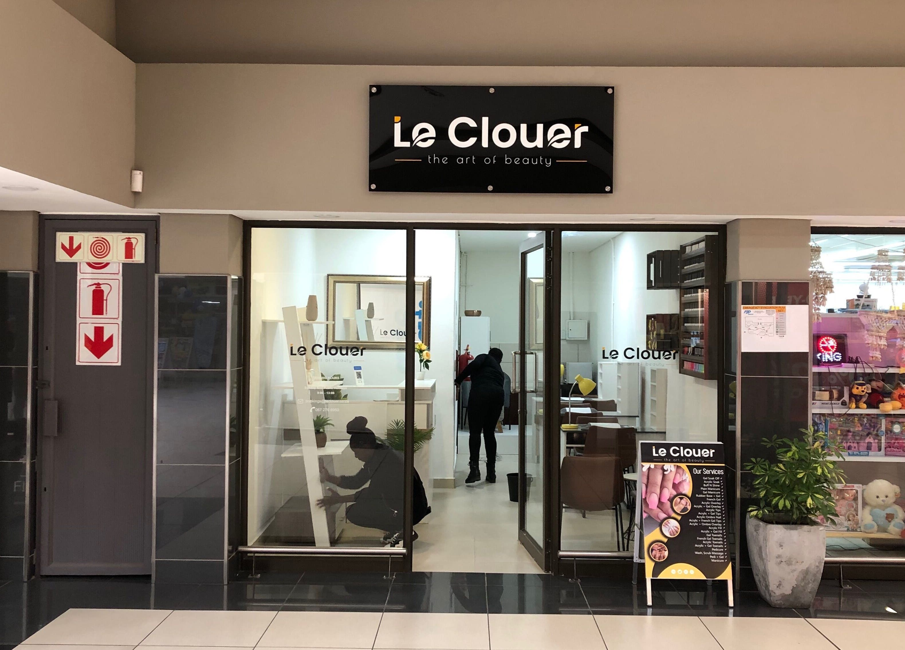 Entrance of Le Clouer beauty salon in Kempton Park, Gauteng, ZA, showcasing elegant interior design.