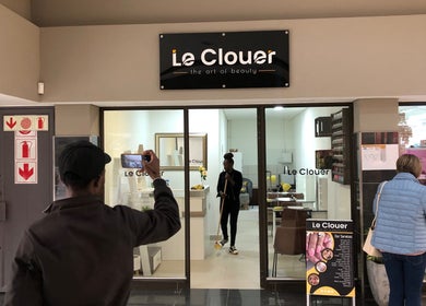 Entrance of Le Clouer beauty salon in Kempton Park, Gauteng, ZA showcasing its modern interior.