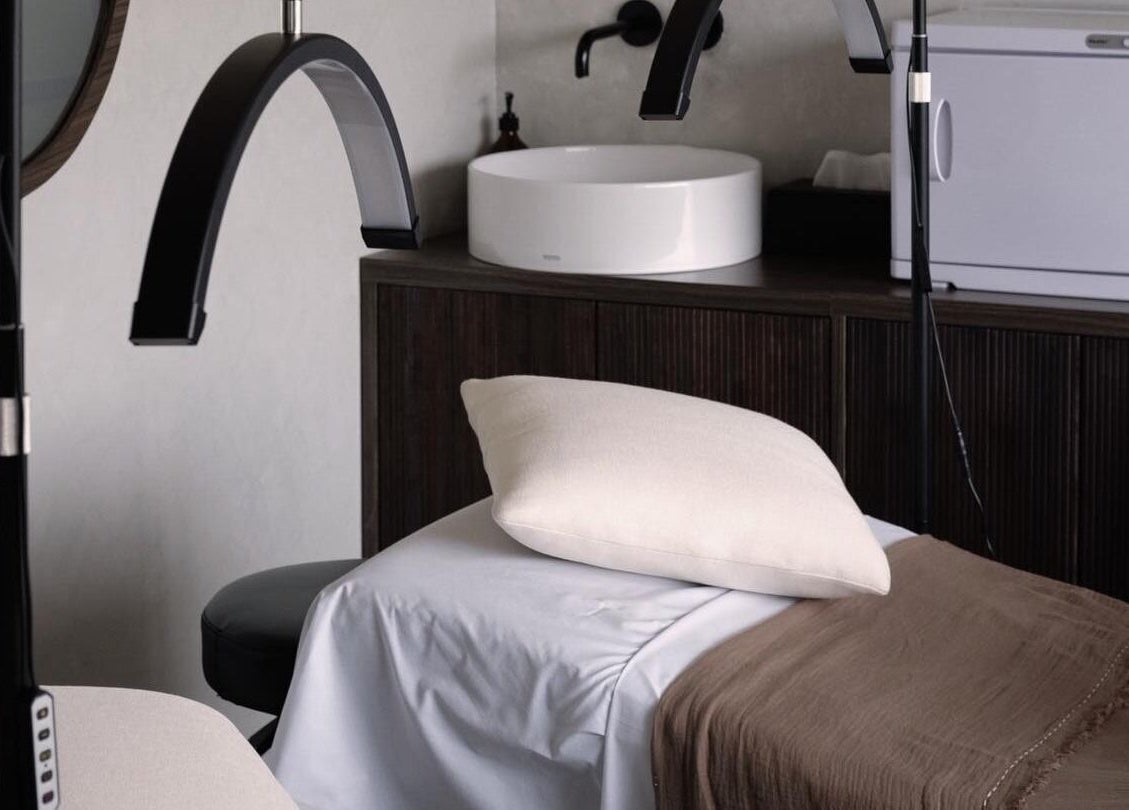 Luxurious treatment room at Saya Holistic Spa, Bali, Bali, ID, showcasing a serene, modern design.