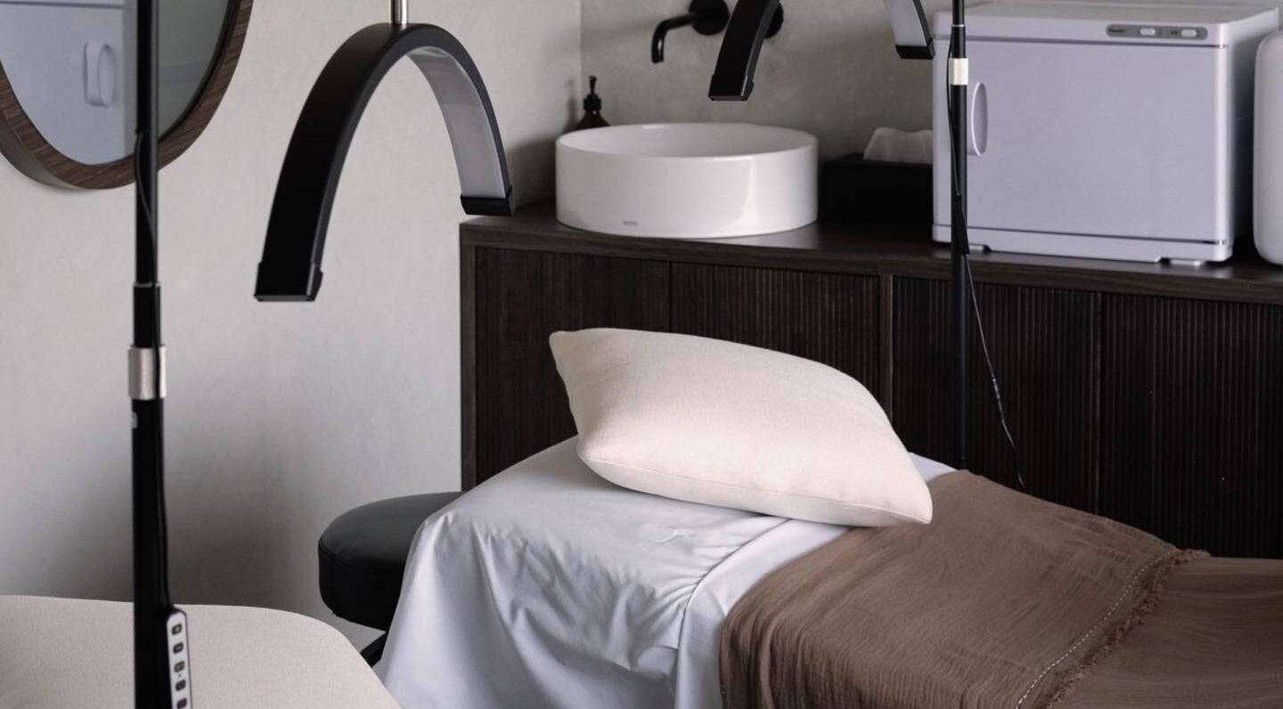 Luxurious treatment room at Saya Holistic Spa, Bali, Bali, ID, showcasing a serene, modern design.