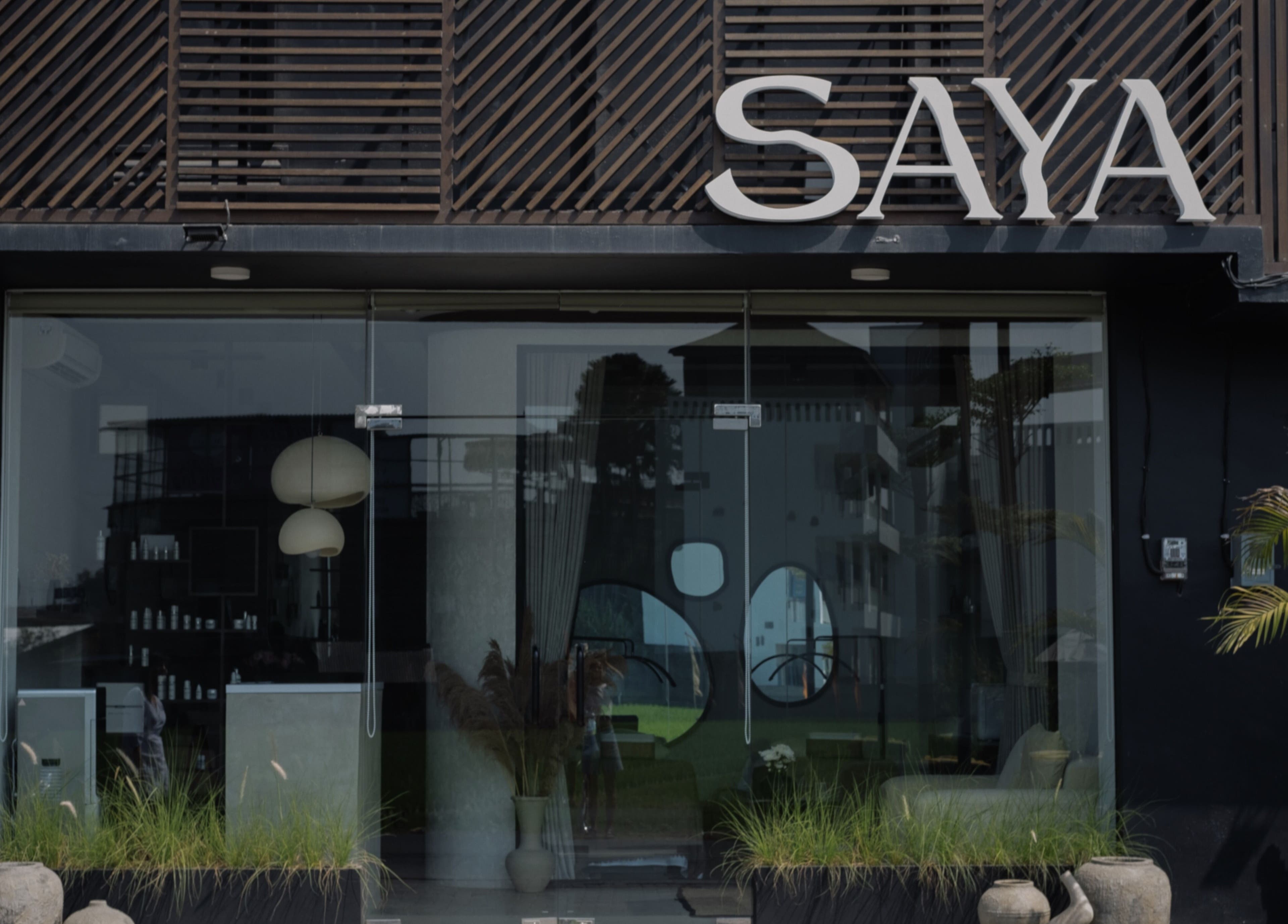 Entrance of Saya Holistic Spa in Bali, Bali, ID, featuring modern design and tranquil ambiance.