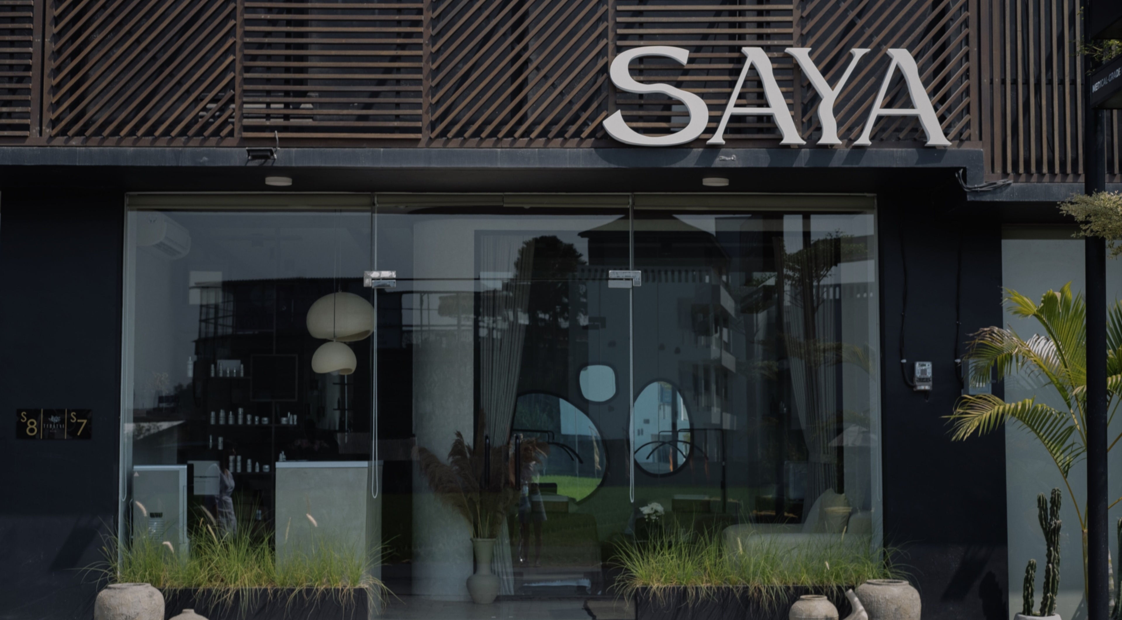 Entrance of Saya Holistic Spa in Bali, Bali, ID, featuring modern design and tranquil ambiance.