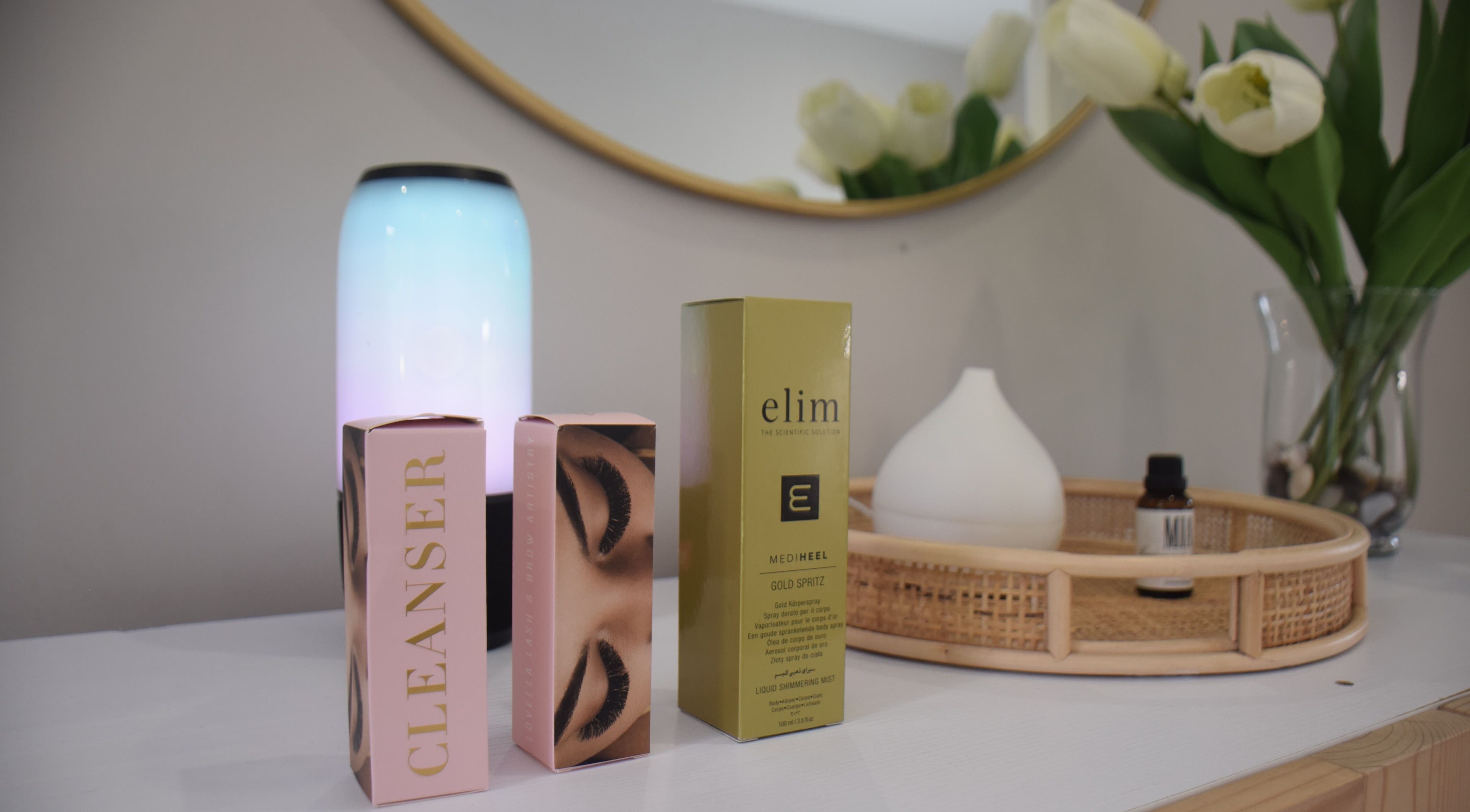 Beauty products at The Brow Artist ZA, Cape Town, Western Cape, ZA with ambient lighting.