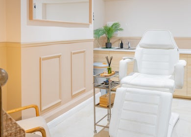 Luxurious treatment chair at The Skin Studio, London, England, GB. Modern spa ambiance.