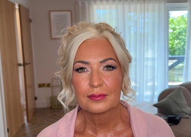 Elegant makeup look at Aroha Makeup in Cwmbran, Wales, GB, showcasing flawless application and stylish updo.
