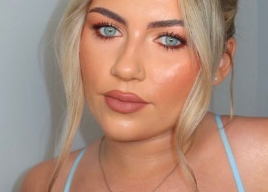 Aroha Makeup in Cwmbran, Wales, showcases flawless makeup with bold eyes and soft lips.