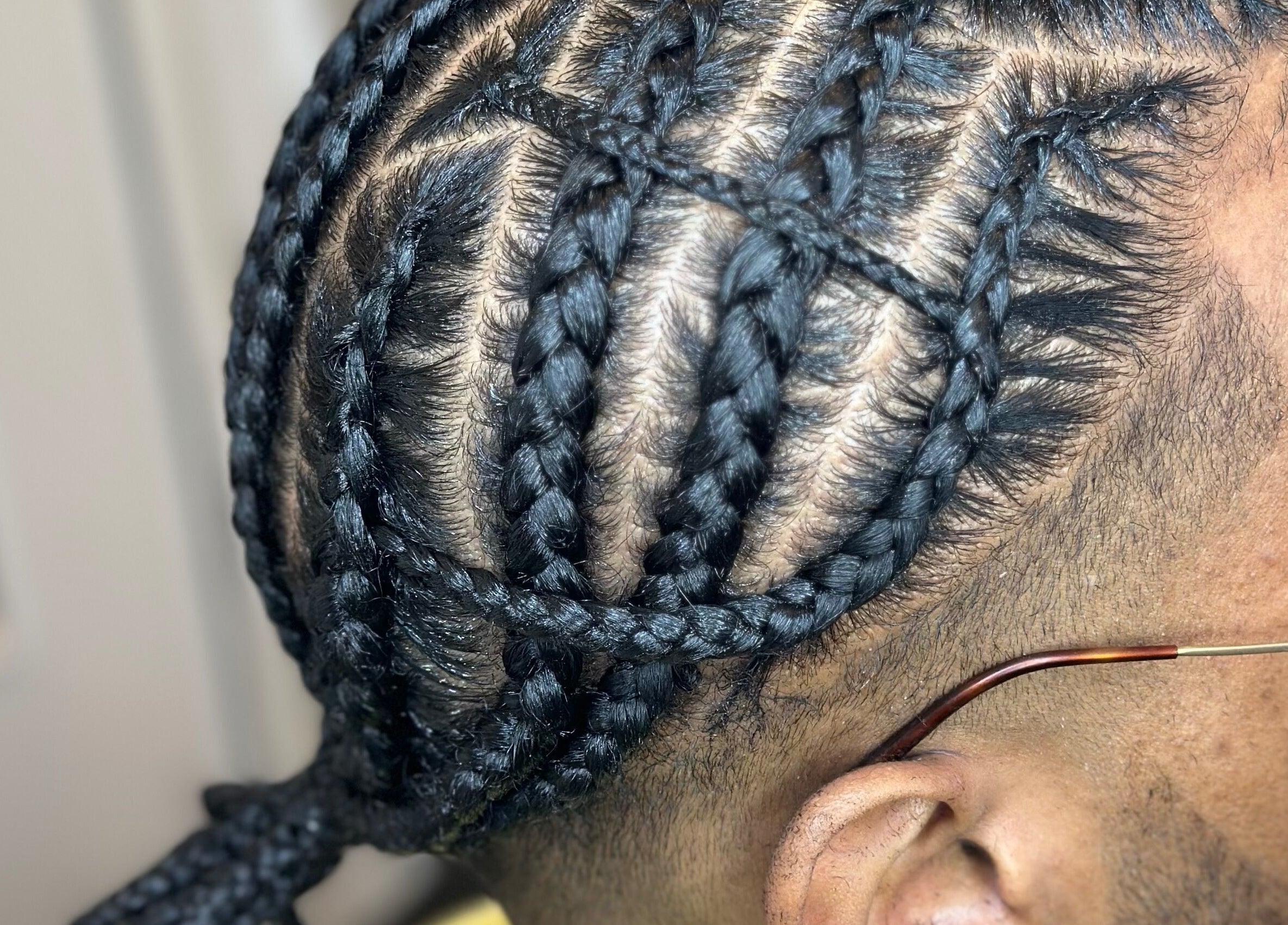 Intricate braided hairstyle at AB Styles and Services, Dordrecht, Zuid-holland, NL showcase unique geometry.