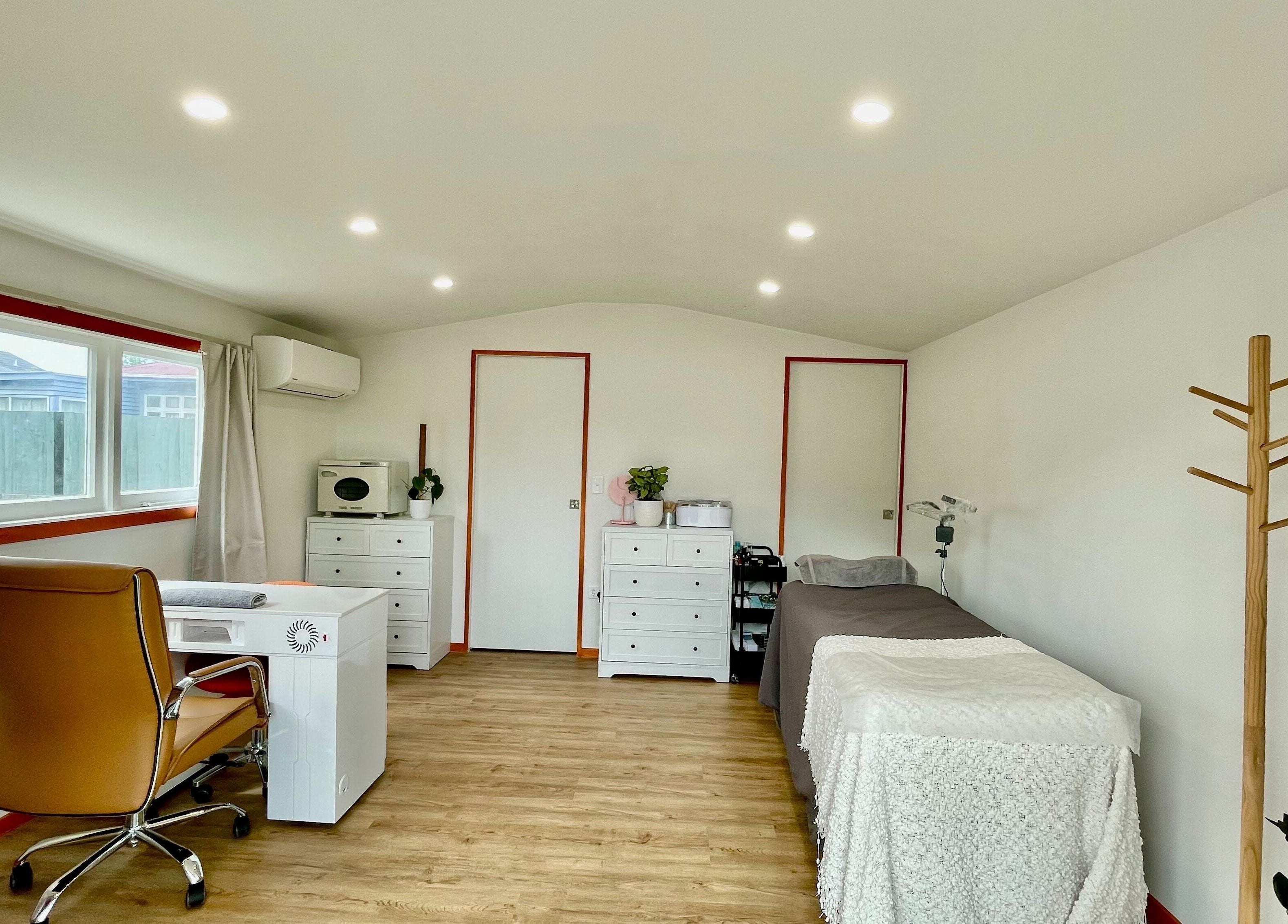 Elegant treatment room at Mercury Beauty Studio, Christchurch, Canterbury, NZ with cozy ambience.