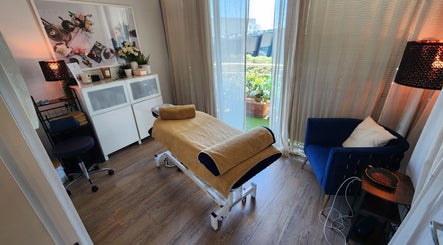 Tranquil massage room at Medicus Massage, Bondi Junction, New South Wales, AU with calming decor and natural light.