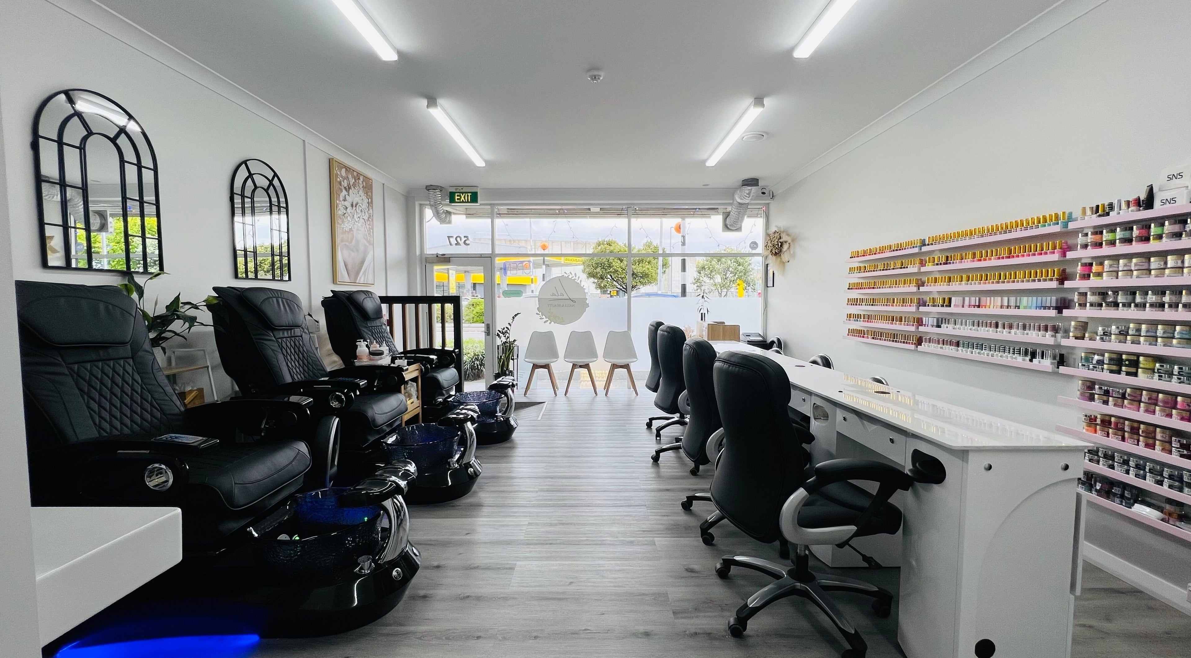 Modern interior of Lala Nails and Beauty in Lower Hutt, Wellington, NZ featuring cozy pedicure chairs.
