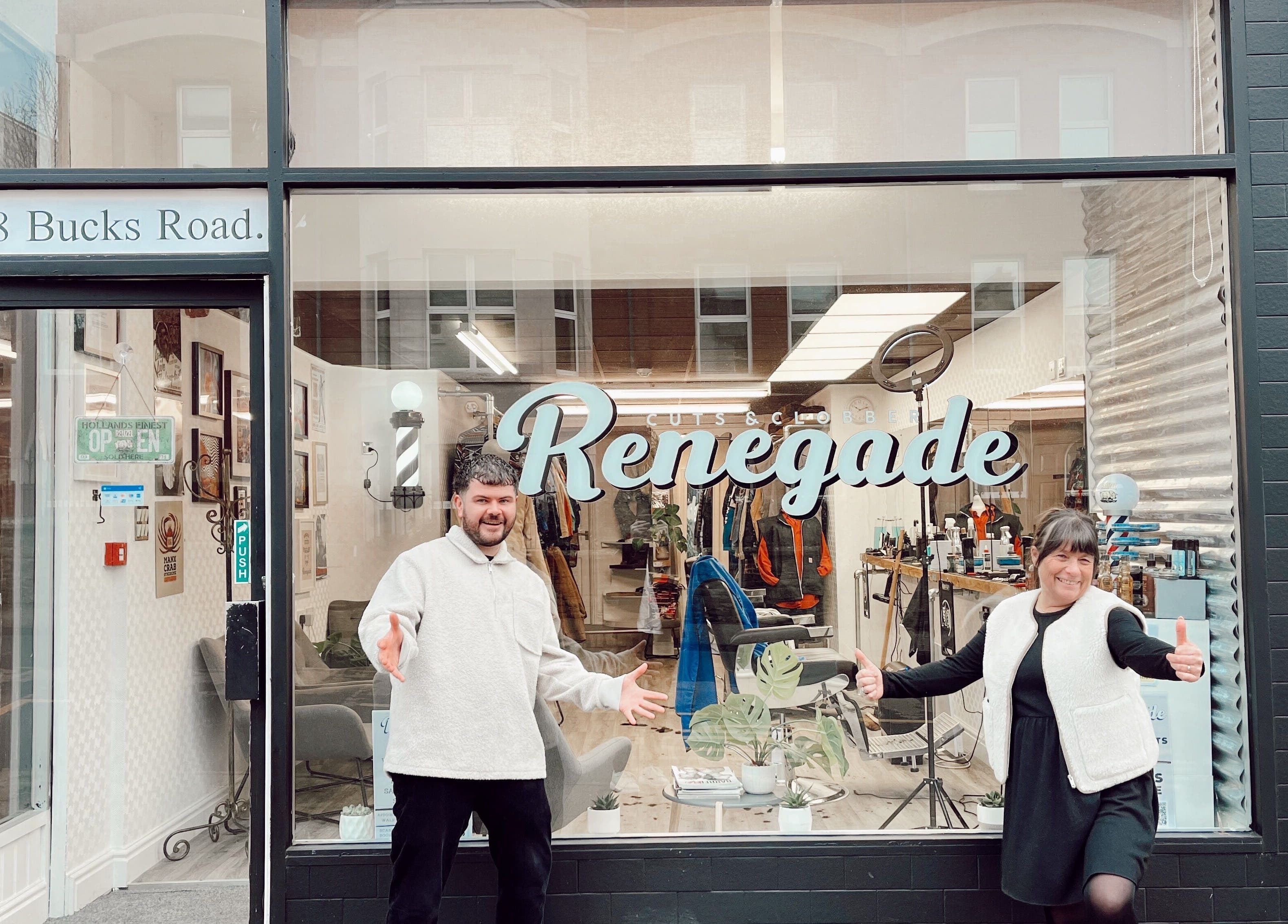 Front exterior of Renegade: Cuts and Clobber in Douglas, welcoming customers with open arms.