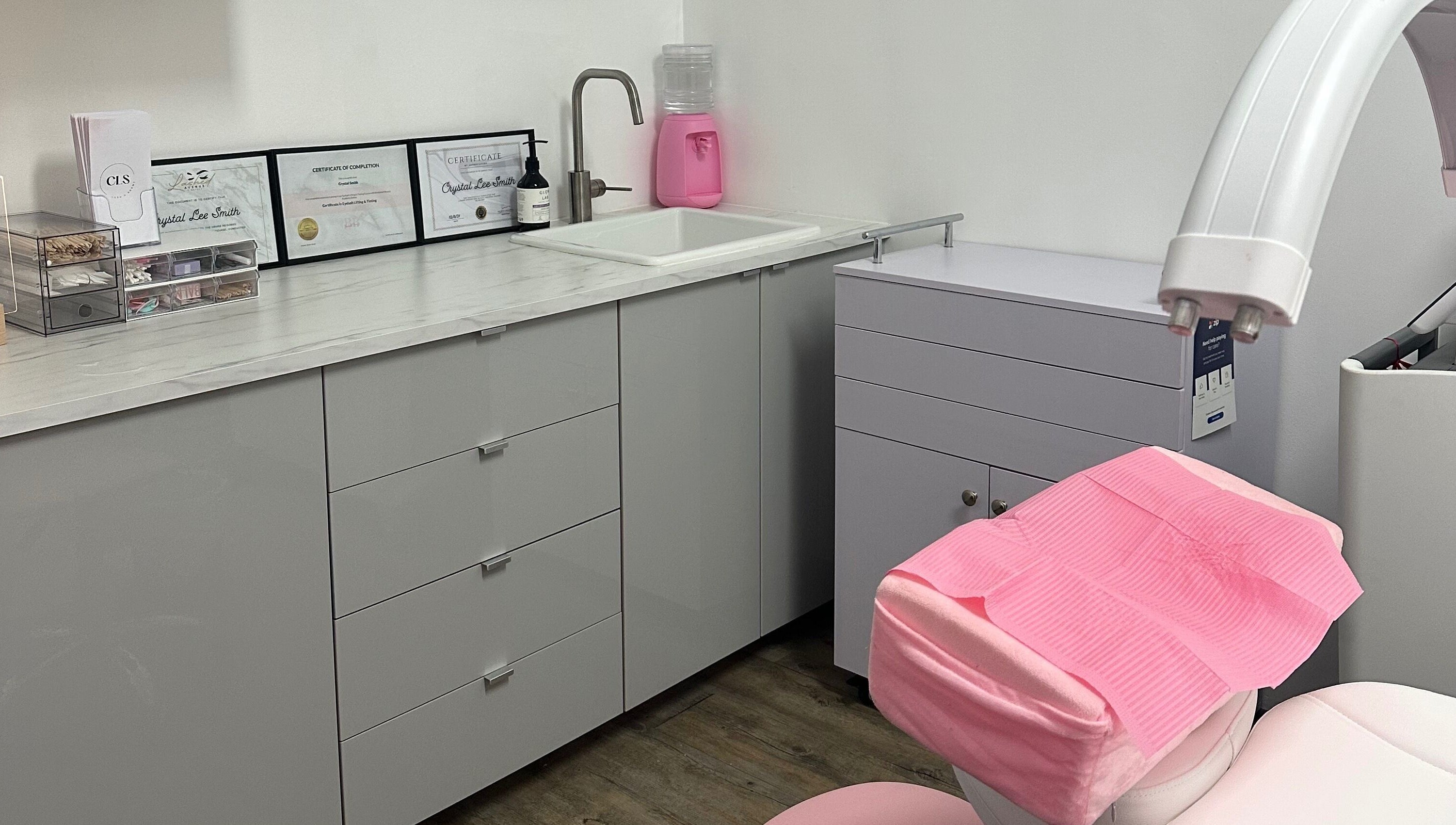 Modern treatment room at CLS Lash and Brows in Miranda, New South Wales, AU with certificates displayed.