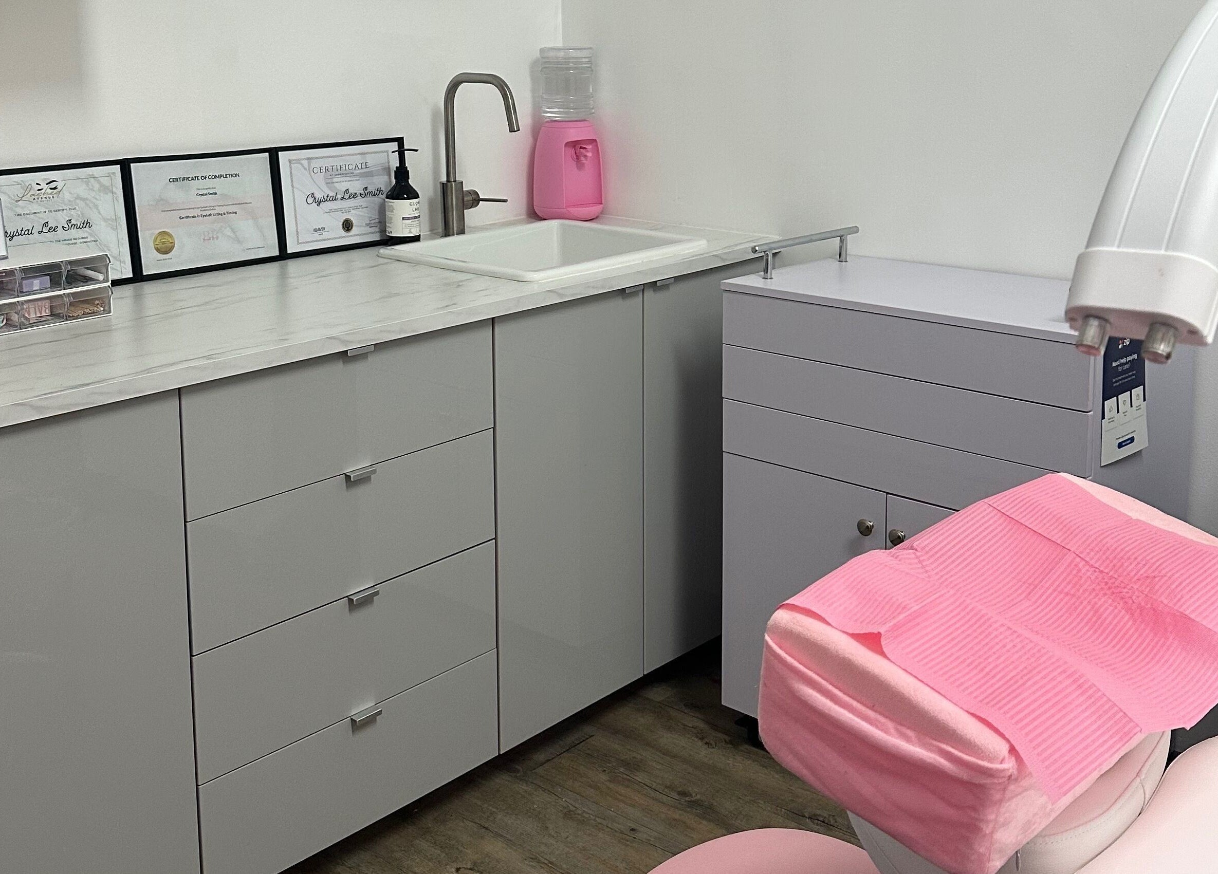 Modern treatment room at CLS Lash and Brows in Miranda, New South Wales, AU with certificates displayed.