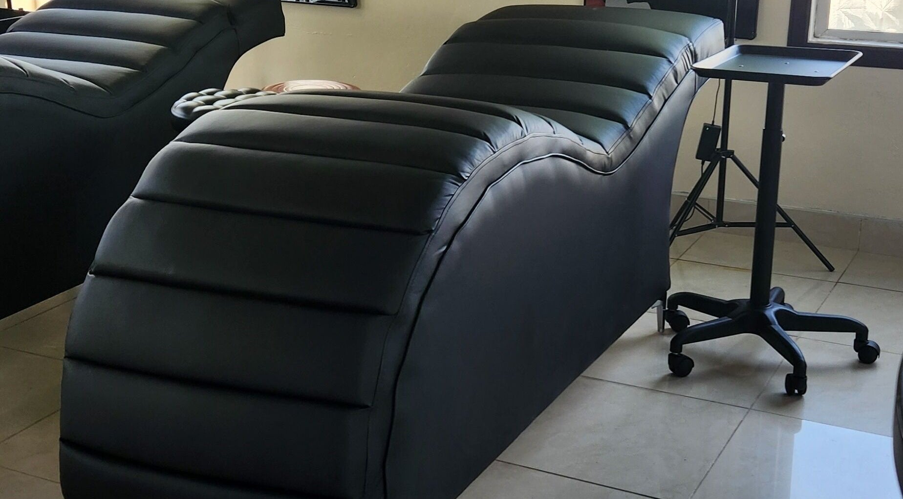 Comfortable beauty treatment lounger at Mirror Mirror Permanent Makeup and Beauty, Durban, Kwazulu-natal, ZA.