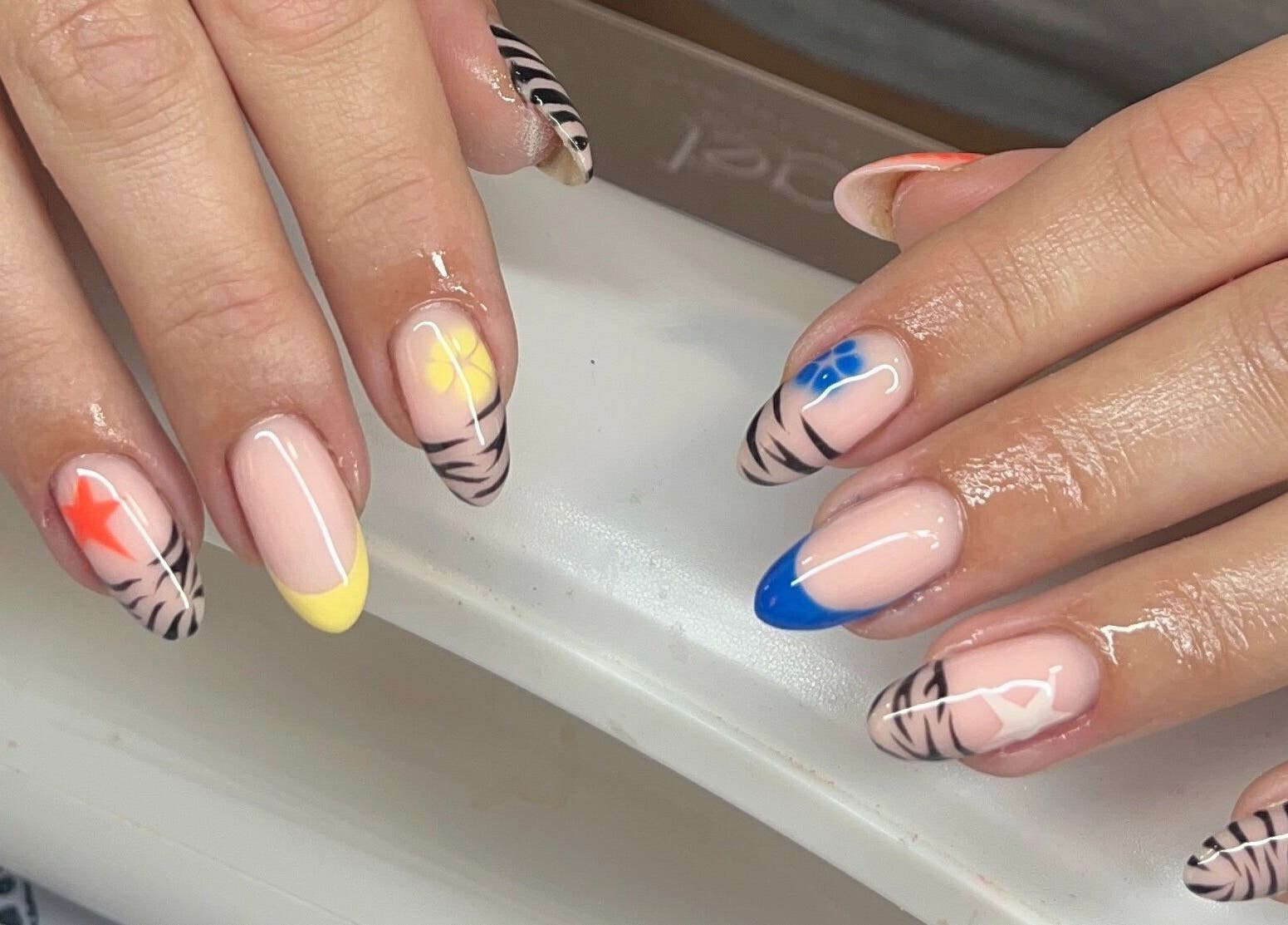 Colorful nail art at Josie Leah’s Beauty in Montriond, Auvergne-rhône-alpes, FR showcasing creative designs.