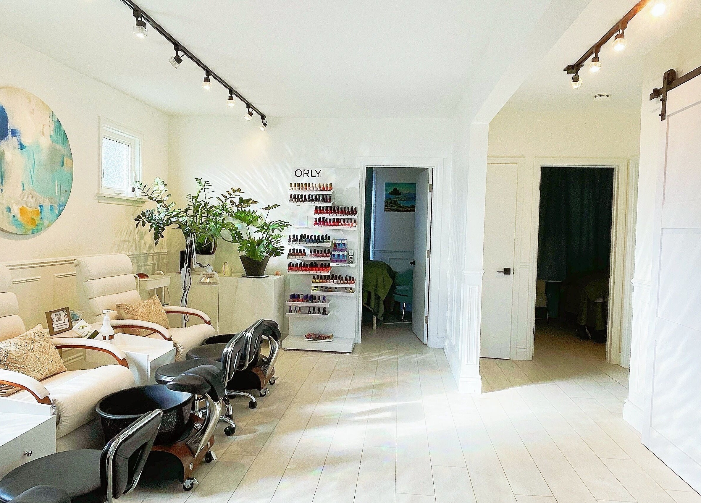 Relaxing spa pedicure chairs at SPA OJAS, Winnipeg, Manitoba, CA, creating a serene and inviting atmosphere.