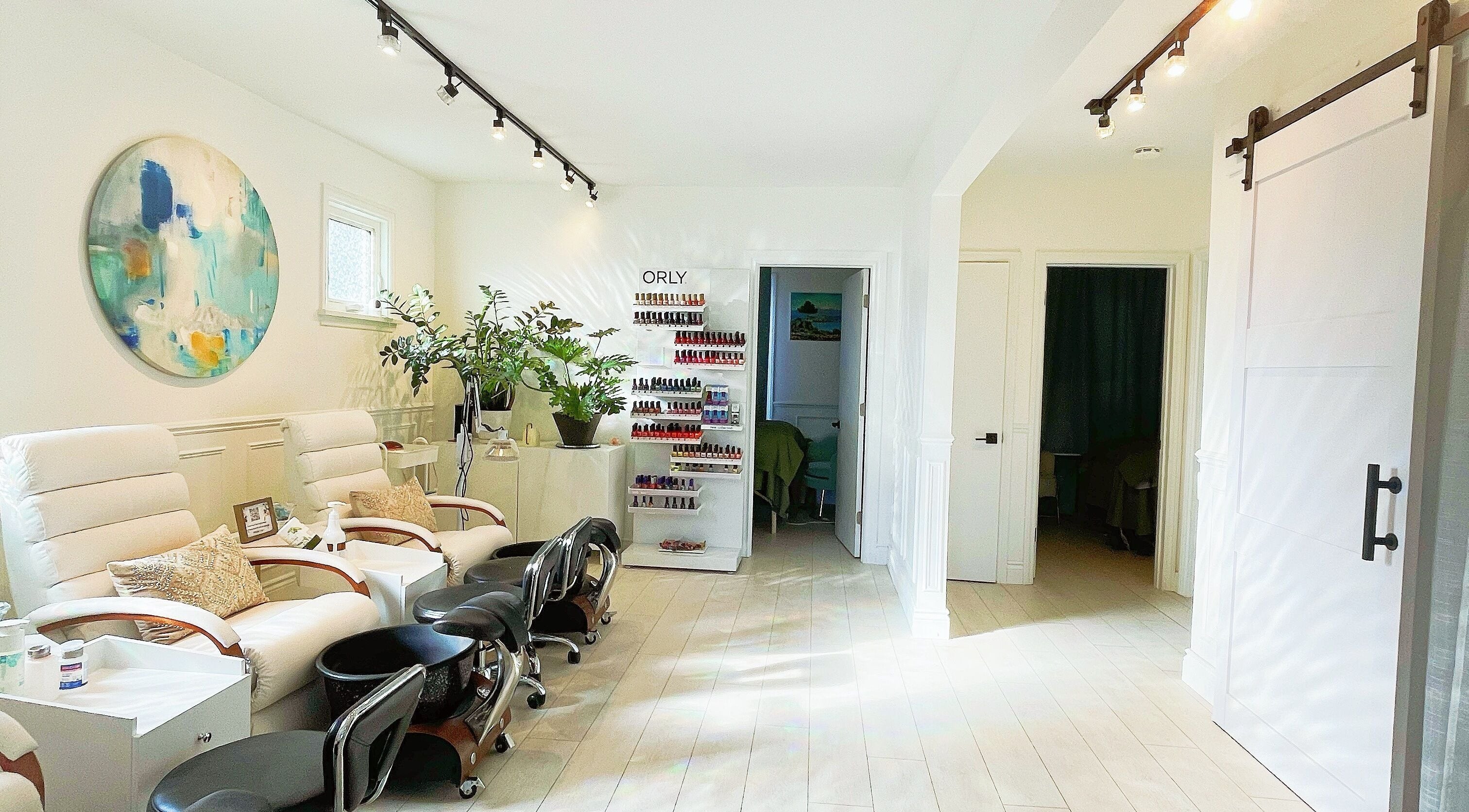 Relaxing spa pedicure chairs at SPA OJAS, Winnipeg, Manitoba, CA, creating a serene and inviting atmosphere.