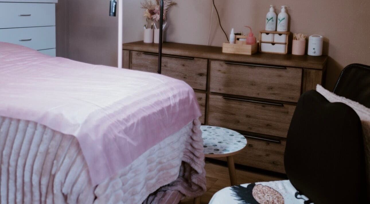 Cozy treatment room at Beauty-Full By Sage in Whitfield, Queensland, AU with soft pink accents and lush decor.
