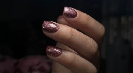 Close-up of glittery manicured nails at Amethyst Beauty, Westhill, Scotland, GB.