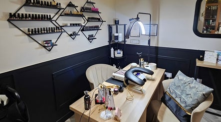Cozy nail service area with polish display at Scarra Beauty, Oban, Scotland, GB.