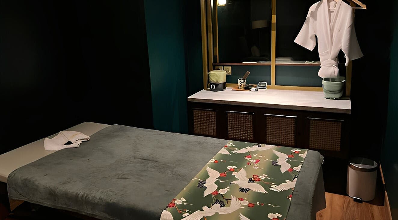 Relaxing treatment room at Ame Spa Thamrin, Daerah Khusus Ibukota Jakarta, ID, featuring comfy massage table.