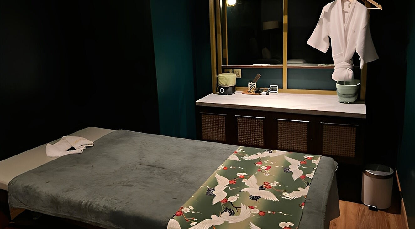 Relaxing treatment room at Ame Spa Thamrin, Daerah Khusus Ibukota Jakarta, ID, featuring comfy massage table.