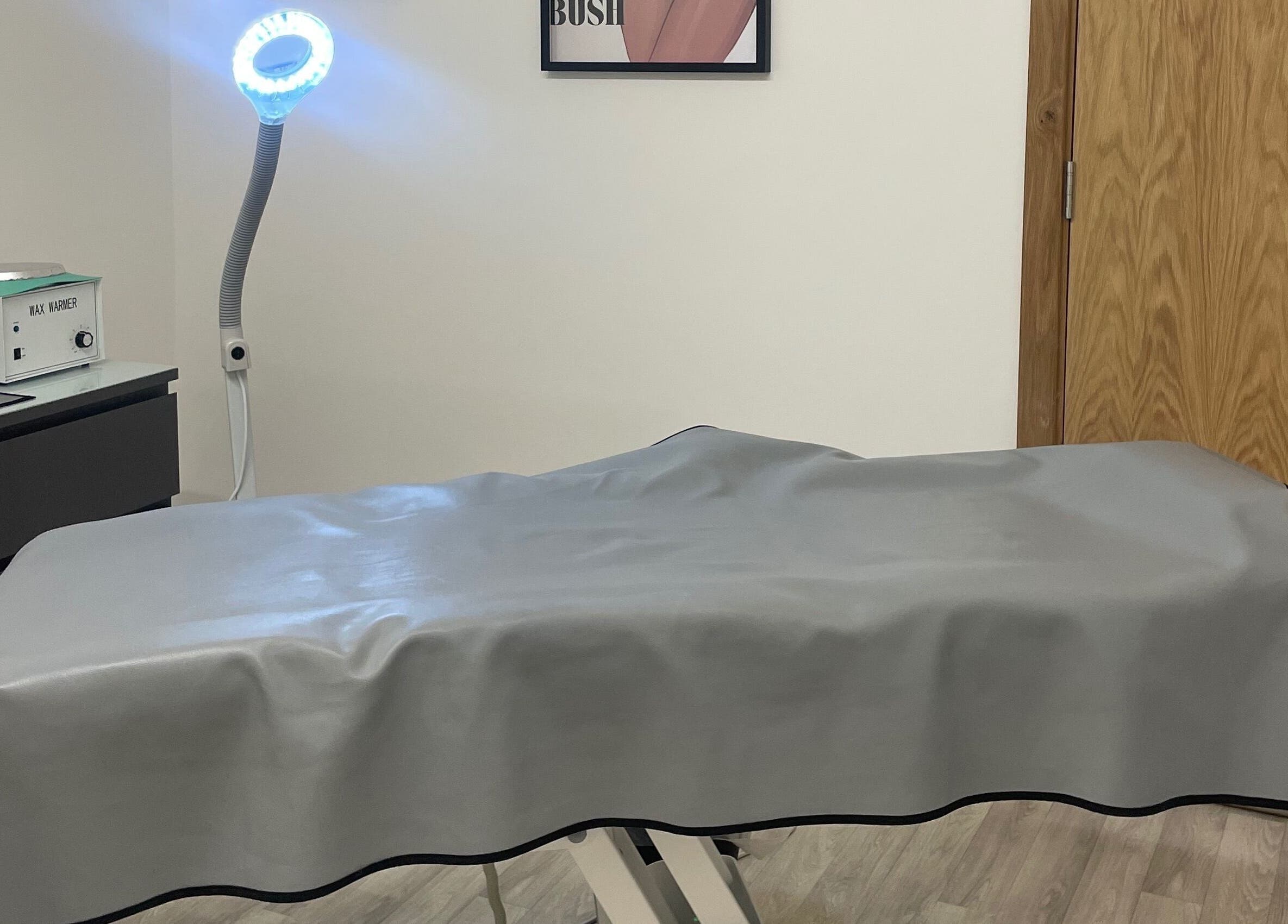 Wax with Hazel - Intimate Wax Specialist treatment room in Wellingborough, England, GB with cozy setup.