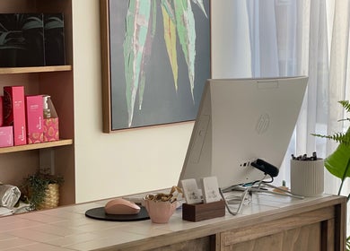 Reception desk with beauty products at Covet Beauty, Waratah, New South Wales, AU.