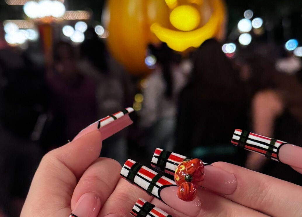 Pumpkin-themed nail art at Blink Nail Spa, Los Angeles, California, US. Perfect for festive occasions.