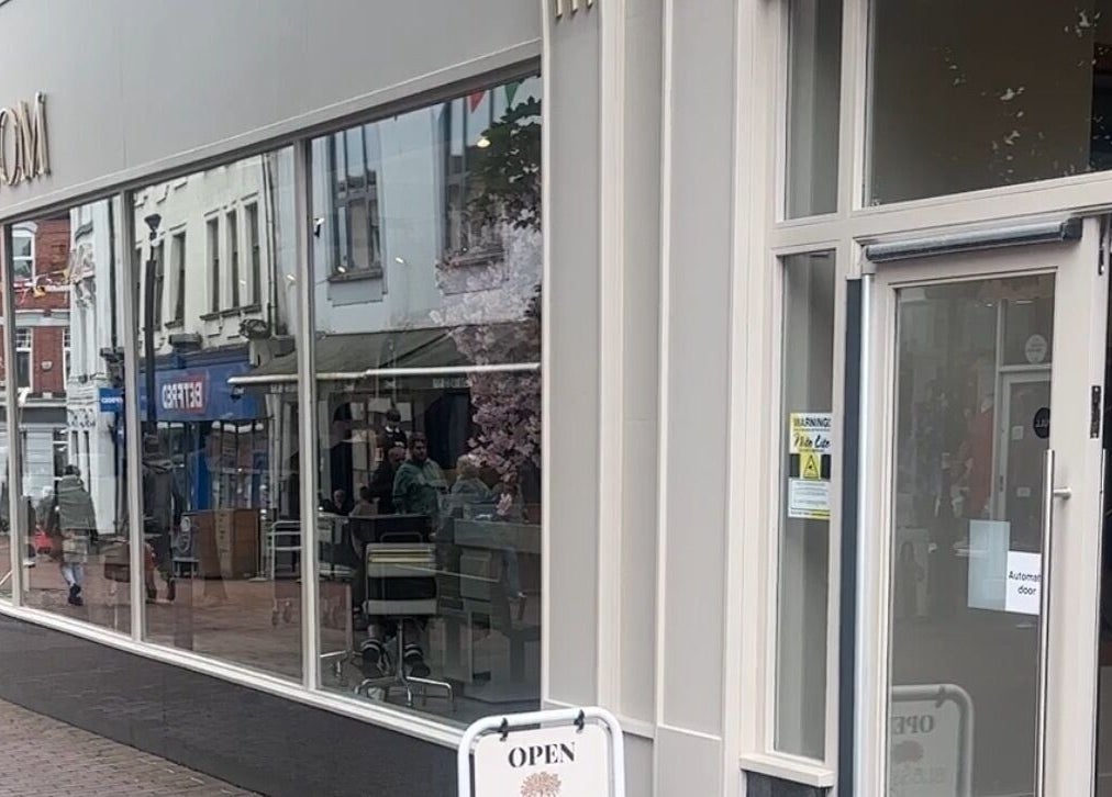 Exterior of Blossom beauty venue in Neath, Wales, GB showcasing its stylish entrance and large windows.