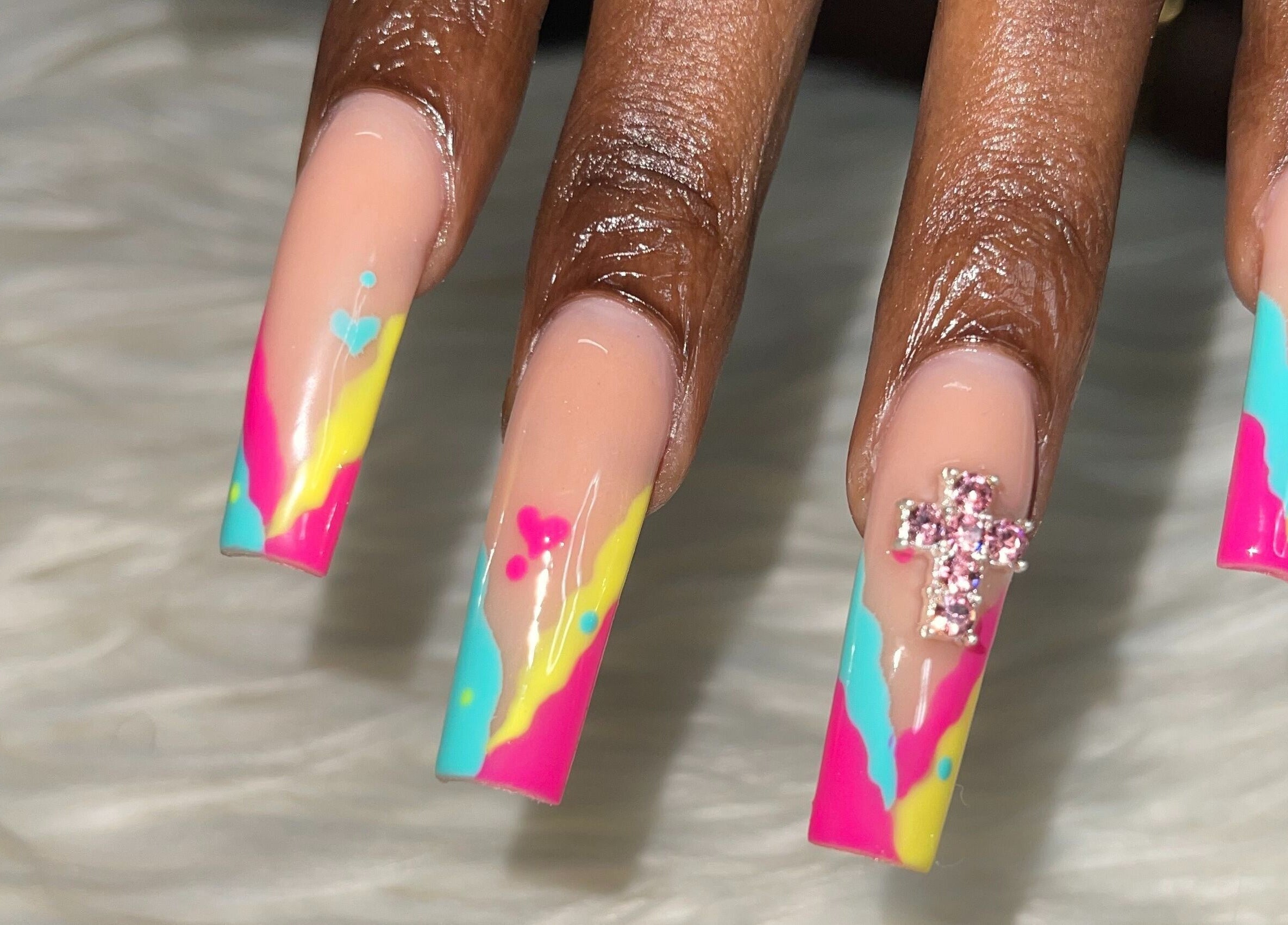 Vibrant neon nail art at TheNailBar, Demerara-mahaica, Demerara-mahaica, GY, featuring colorful designs and embellishments.