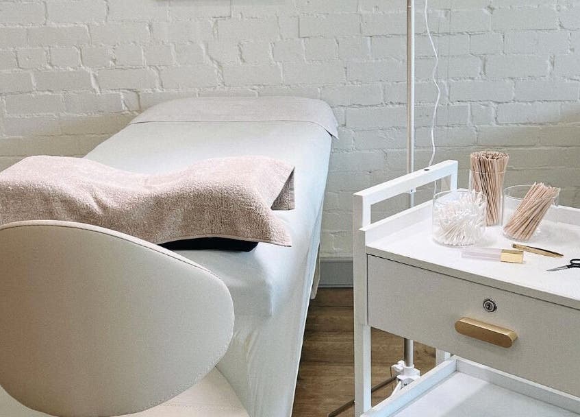 Treatment room at Ona Lash and Brow Bar, Melbourne, Victoria, AU, showcasing a sleek, comfortable setup.