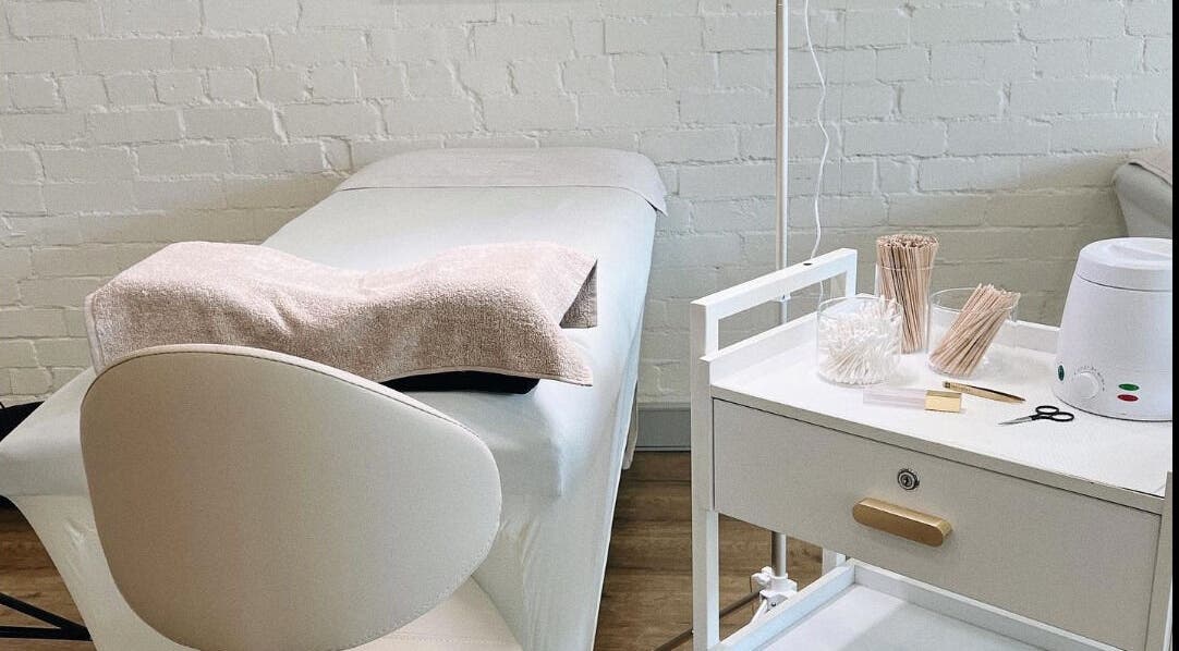 Treatment room at Ona Lash and Brow Bar, Melbourne, Victoria, AU, showcasing a sleek, comfortable setup.