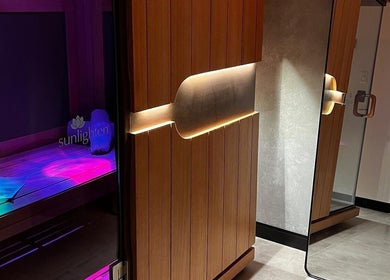 A relaxing sauna at Chill Wellness in Auckland, Auckland, NZ with ambient lighting for ultimate tranquility.