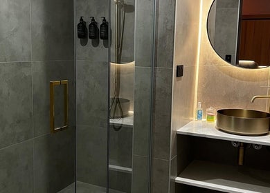 Luxurious bathroom at Chill Wellness, Auckland, NZ featuring modern design and chic decor.